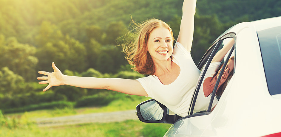 Person Halfway Out of a Car while Driving